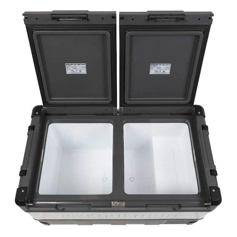 A photo of a MyCOOLMAN 96L Dual Zone Portable Car and Camping Fridge with both compartments empty.