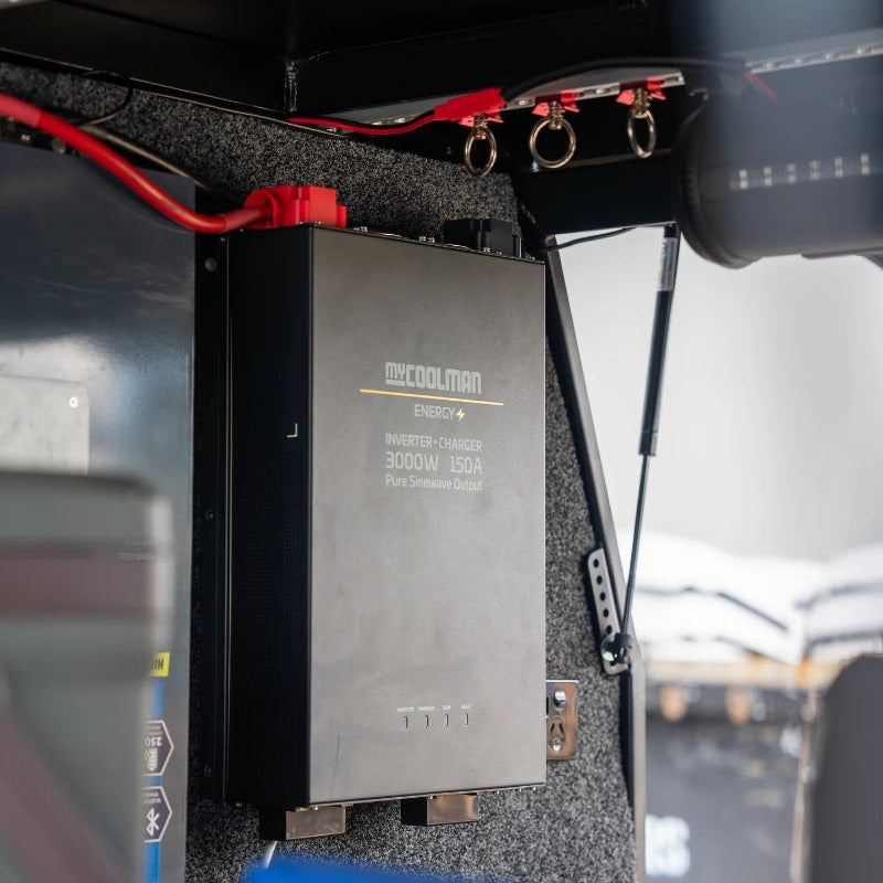 A photo of a MyCOOLMAN 3000W Pure Sine Wave Energy Inverter In a van.