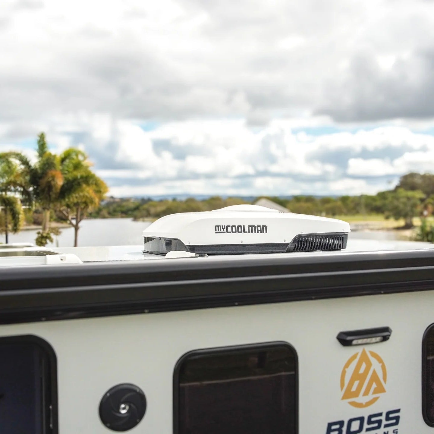 A photo of a MyCoolMan 3KW Roof Top Air Conditioner on the top of a caravan.