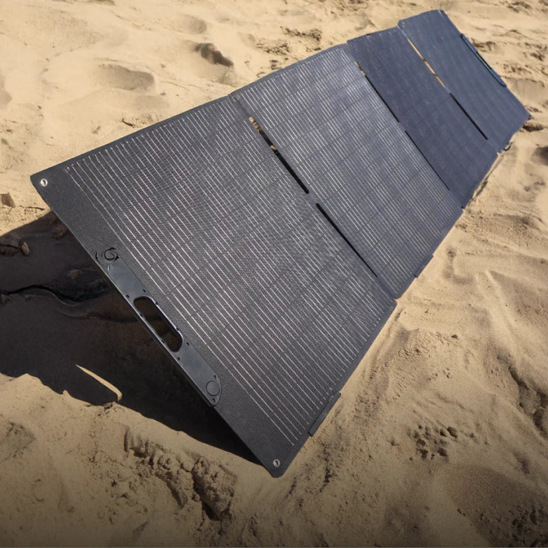 A photo of an iTechWorld 400W Pro Solar Blanket With Raptor Skin on sand.