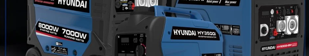 Portable hyundai inverter generators sitting in a row.