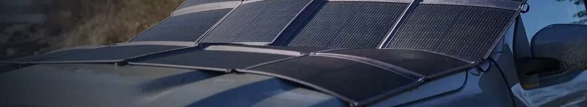 Portable solar panels for camping on a ute.