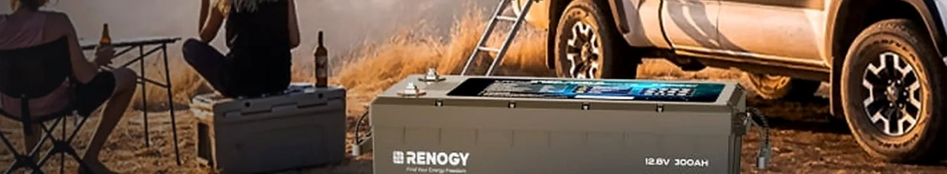 A renogy lithium battery at a campsite.