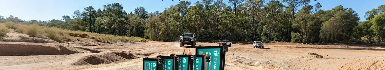 TiStar Lithium batteries sitting on a sandy outback road.