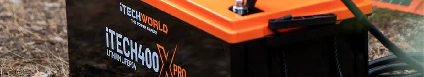 An iTechWorld 400x Pro Lithium Battery at a campsite