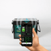 314Ah Tistar Lithium Battery on app with a hand holding a mobile phone on a white background