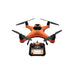 Orange SwellPro Fisherman FD1S fishing drone with carbon fibre propellers beside its remote controller