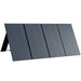 A photo of a Bluetti PV350 350W Solar Panel standing upright showing the front of the solar panel on a slight angle.