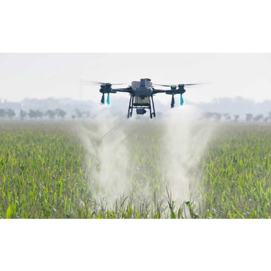 in the photo a DJI Agras T25 Agricultral Drone on the field