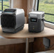 A picture of an EcoFlow 800W Alternator charger with an ecoflow power station and aircon.
