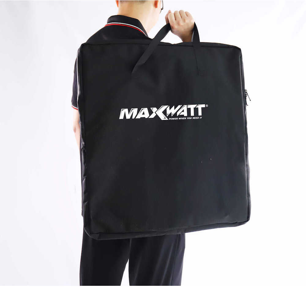 Maxwatt 200W Solar Panel Carry Bag carried by a man