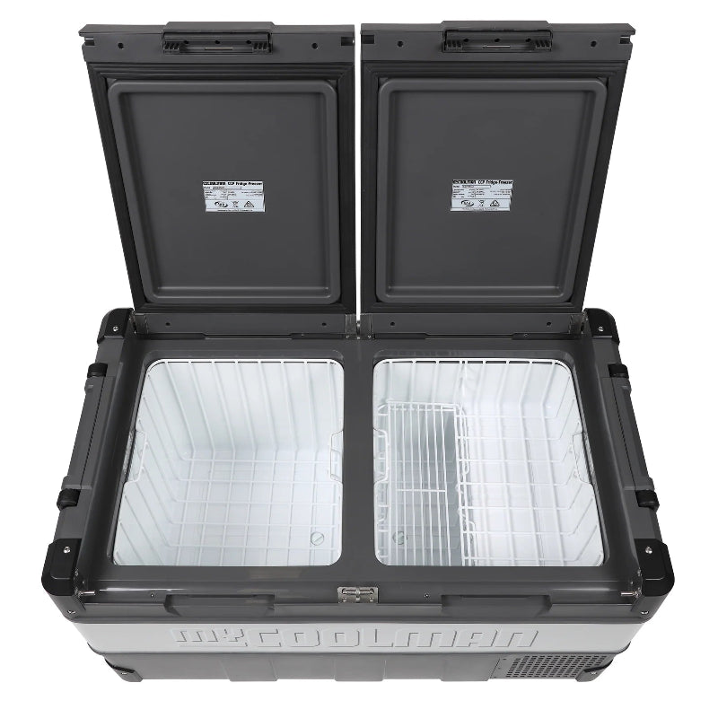 A photo of a MyCOOLMAN 85L Dual Zone Portable Car and Camping Fridge open with empty trays