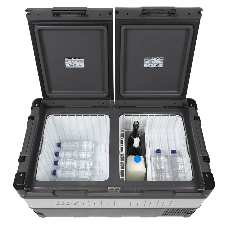 A photo of a MyCOOLMAN 85L Dual Zone Portable Car and Camping Fridge stocked up with water, milk and wine.