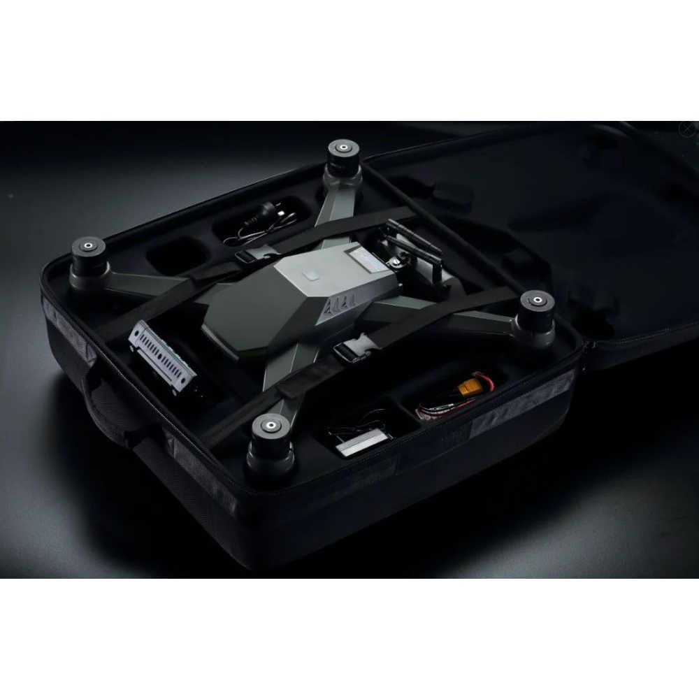 SharkX Drone with bait release case on black surface