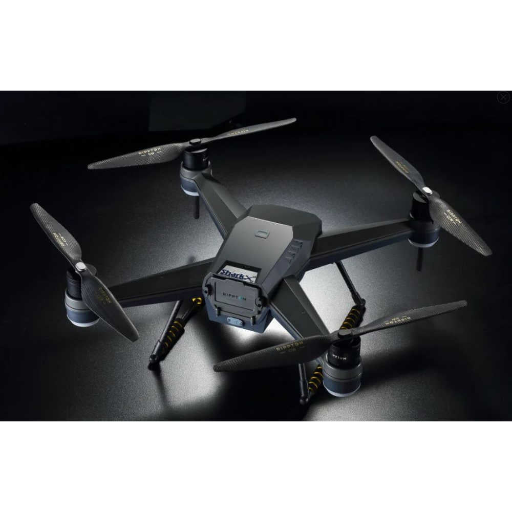 SharkX Fishing Drone another angle black on top of a black surface