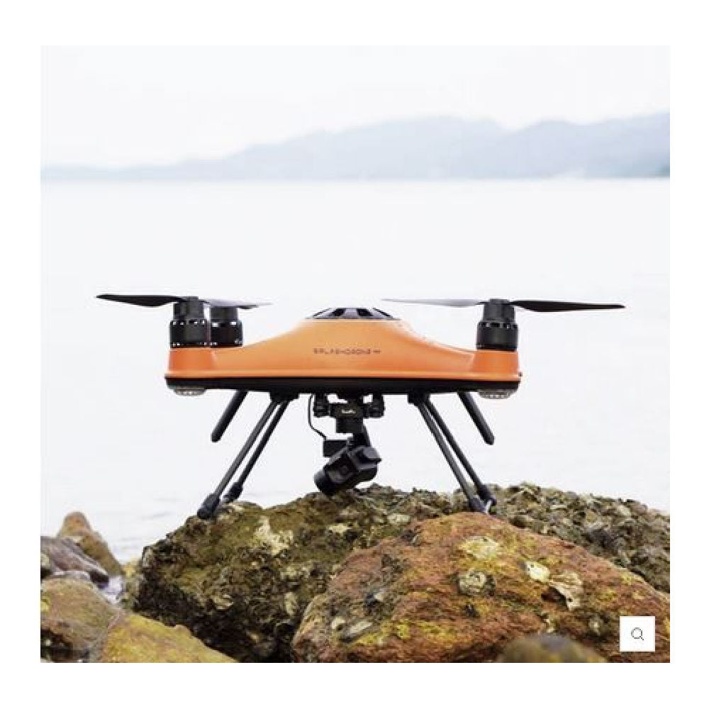 Splashdrone 4 Fishing Drone on top of a rock on the seashore