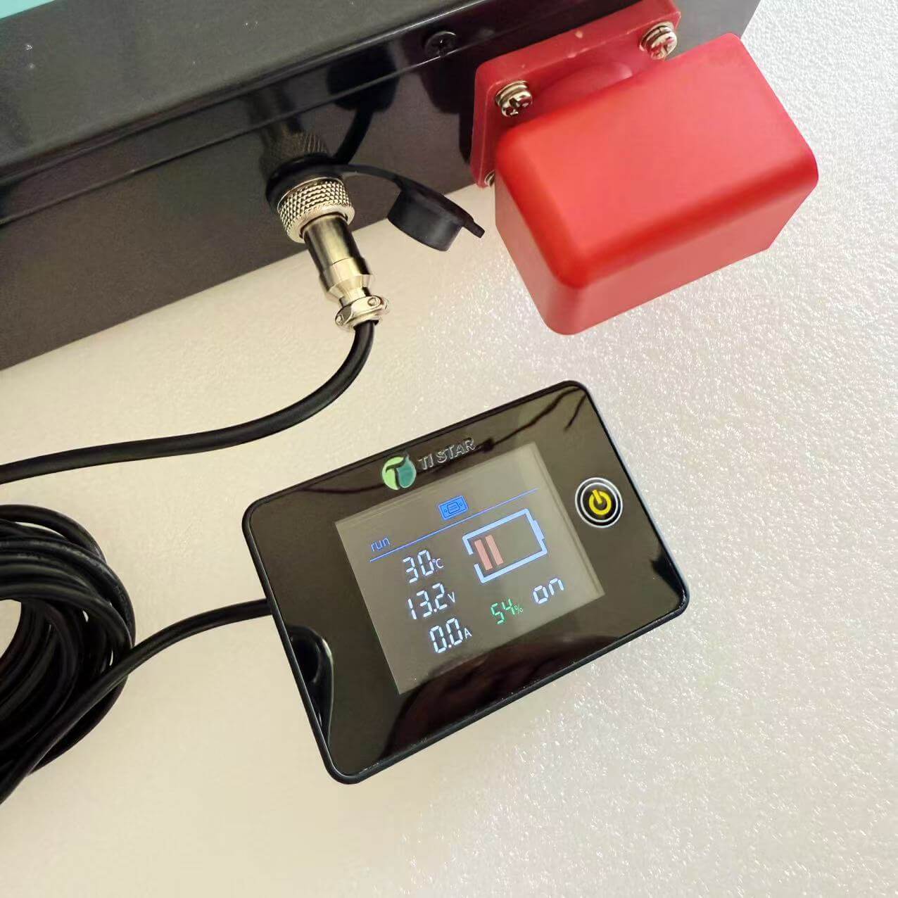 Tistar 150Ah Slimline with connected power status controls on the ground