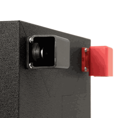 A photo of a black custom lithium 560ah 12v lithium battery on an angle showing both the terminal connections of the battery.