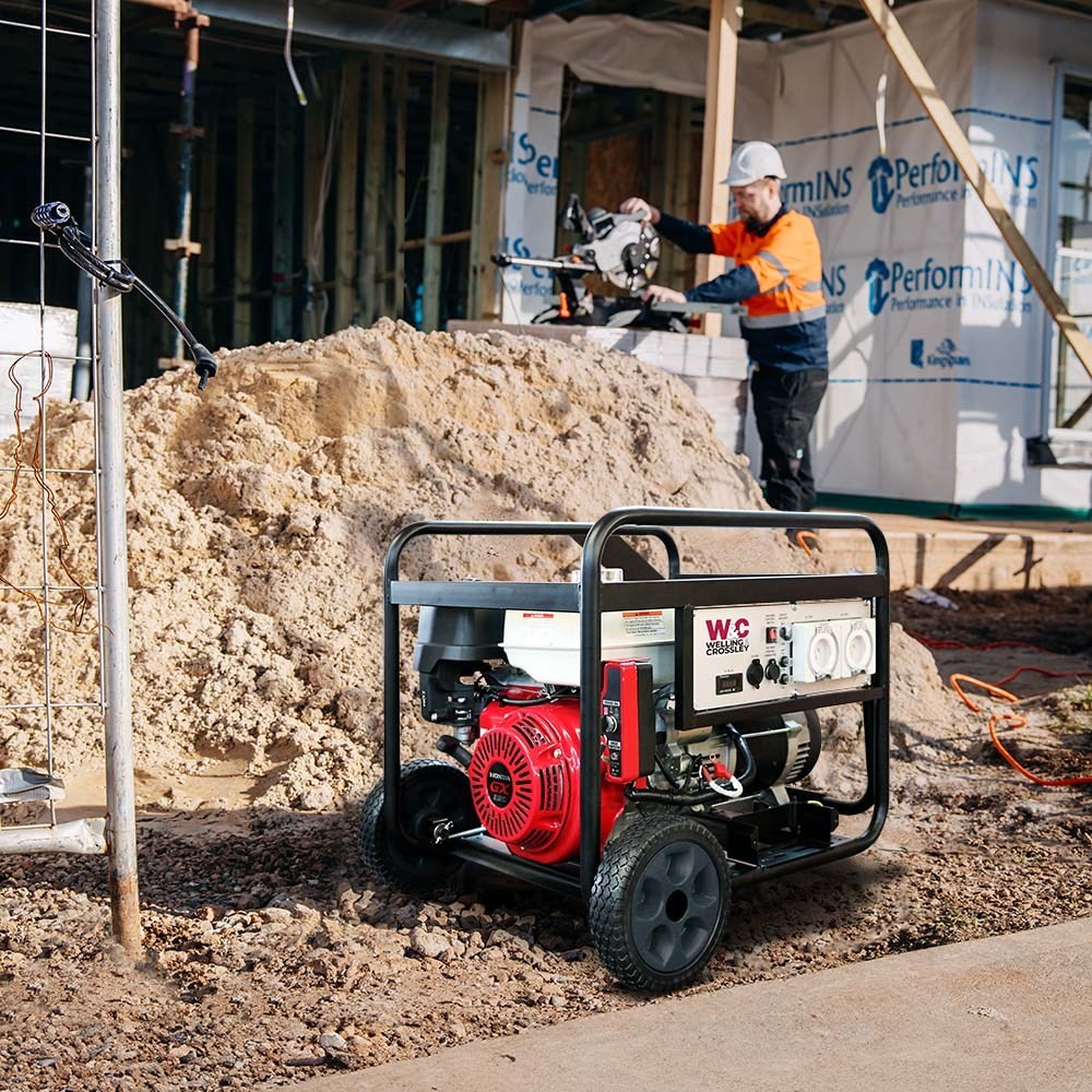 Welling and Crossley WC-P7750H generator powering tools on a building site