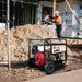 Welling and Crossley WC-P7750H generator powering tools on a building site