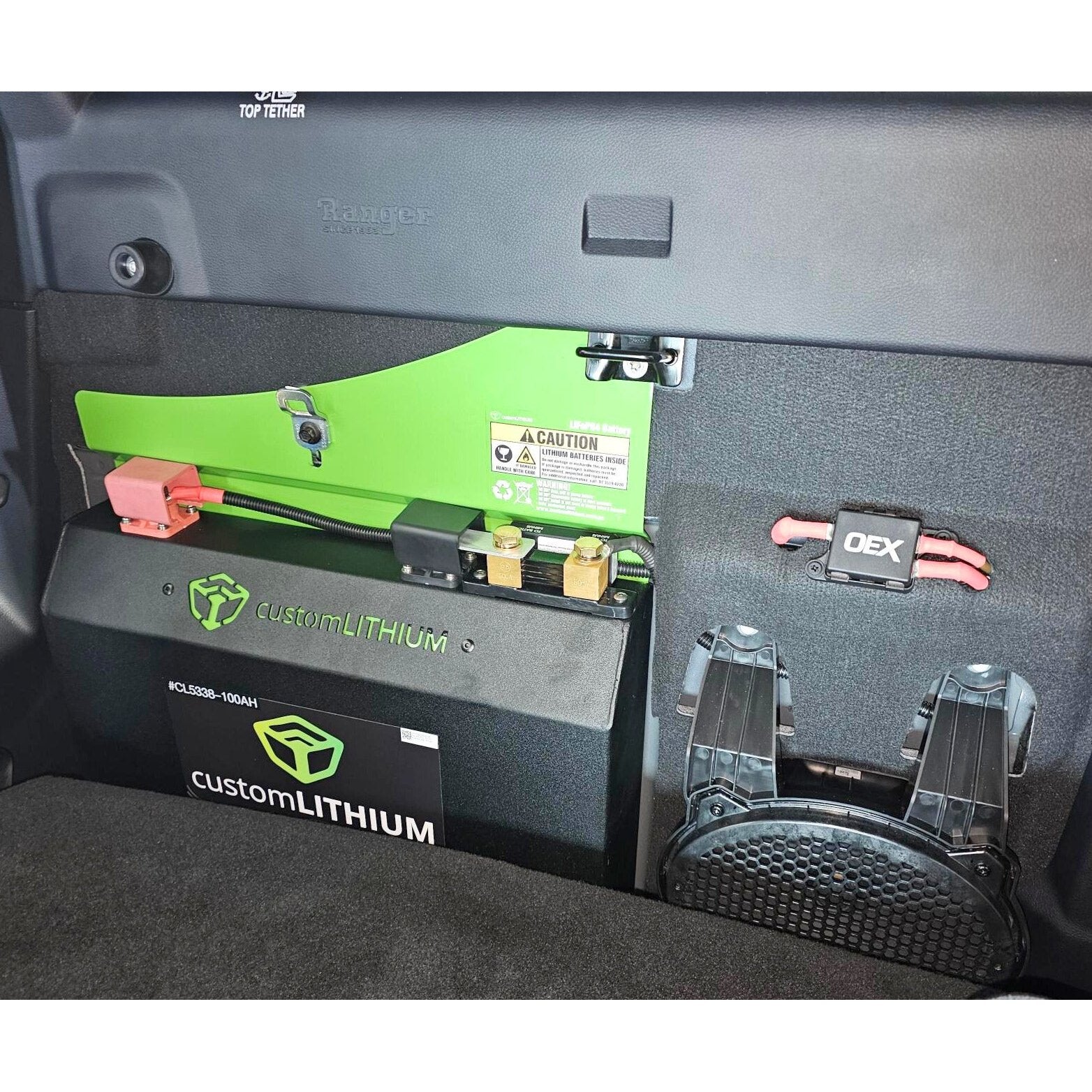 Custom Lithium dual battery installed behind the rear seats of a Ford Ranger dual cab with wiring and isolator in place.