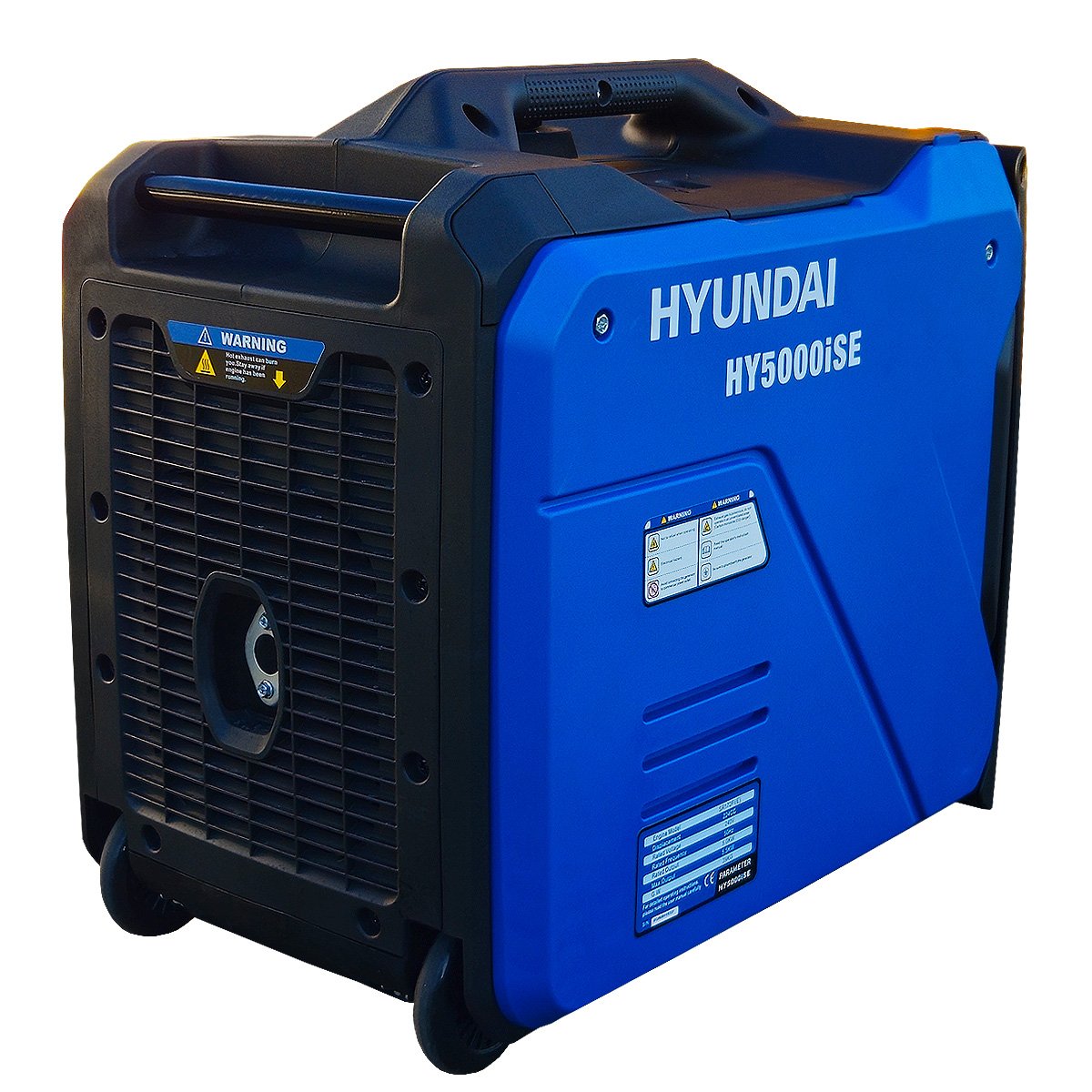 Rear three-quarter view of the Hyundai HY5000iSE inverter generator showing the ventilated rear panel, warning labels and rear wheels.