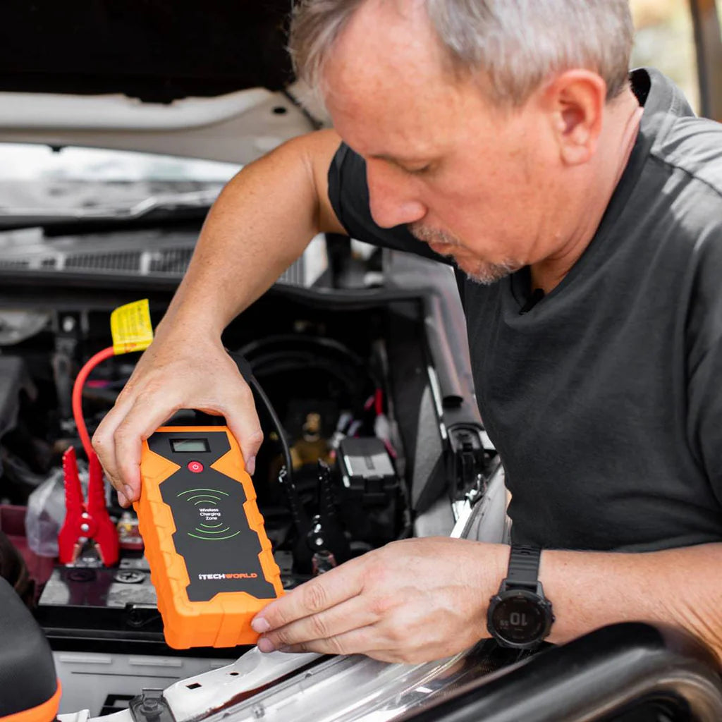 iTechWorld 2000A Lithium Jump Starter in use on a car