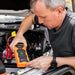 iTechWorld 2000A Lithium Jump Starter in use on a car