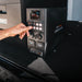 iTechWorld Canopy Mini Power System Control Buttons with the man's hand on the photo