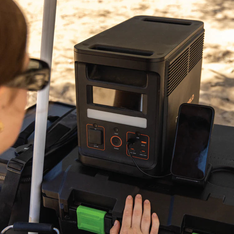 A photo of an iTechWorld PS1800 Pro Portable power station charging a phone.