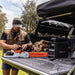A photo of an iTechWorld PS1800 Pro Portable power station connected to a power tool.