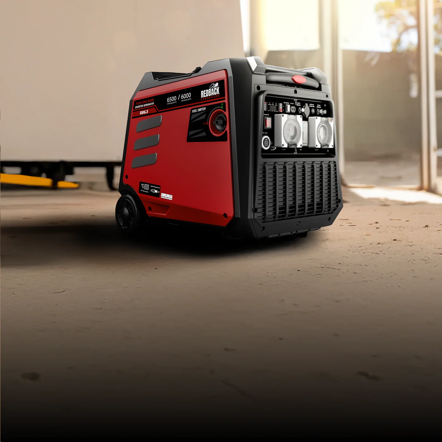 A photo of an iTechWorld Redback 6.5kW portable inverter generator sitting on the floor.