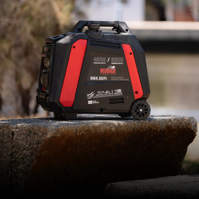 A photo of an iTechWorld Redback RB 4.5 4500W Portable Inverter Generator outdoors.