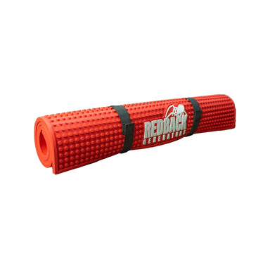 A photo of an iTechWorld Redback Generator Mat Rolled up with a white background.
