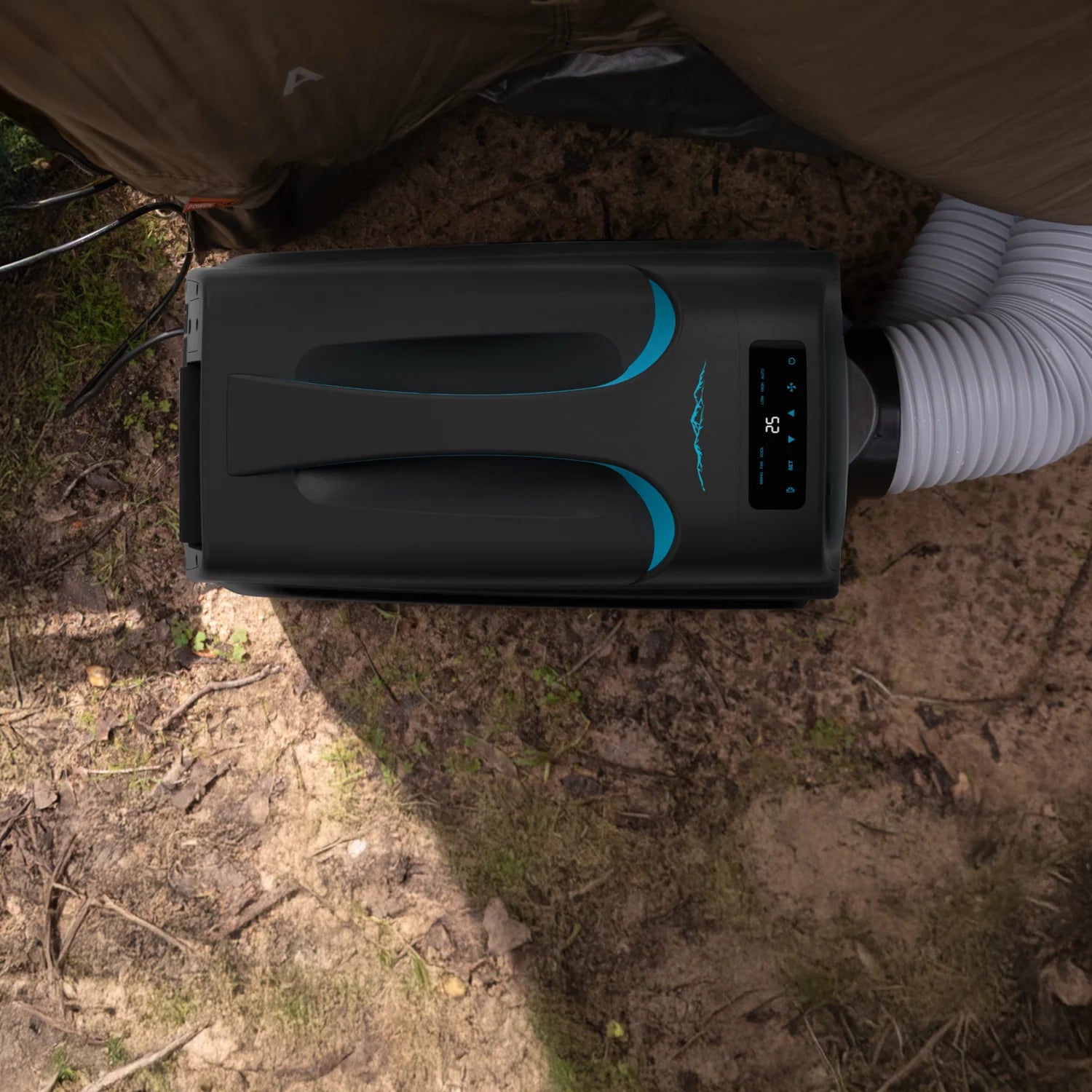 A photo of a black and blue iTechWorld iFrost portable 1000W air conditioner with ducts pointing into a tent.