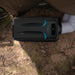 A photo of a black and blue iTechWorld iFrost portable 1000W air conditioner with ducts pointing into a tent.