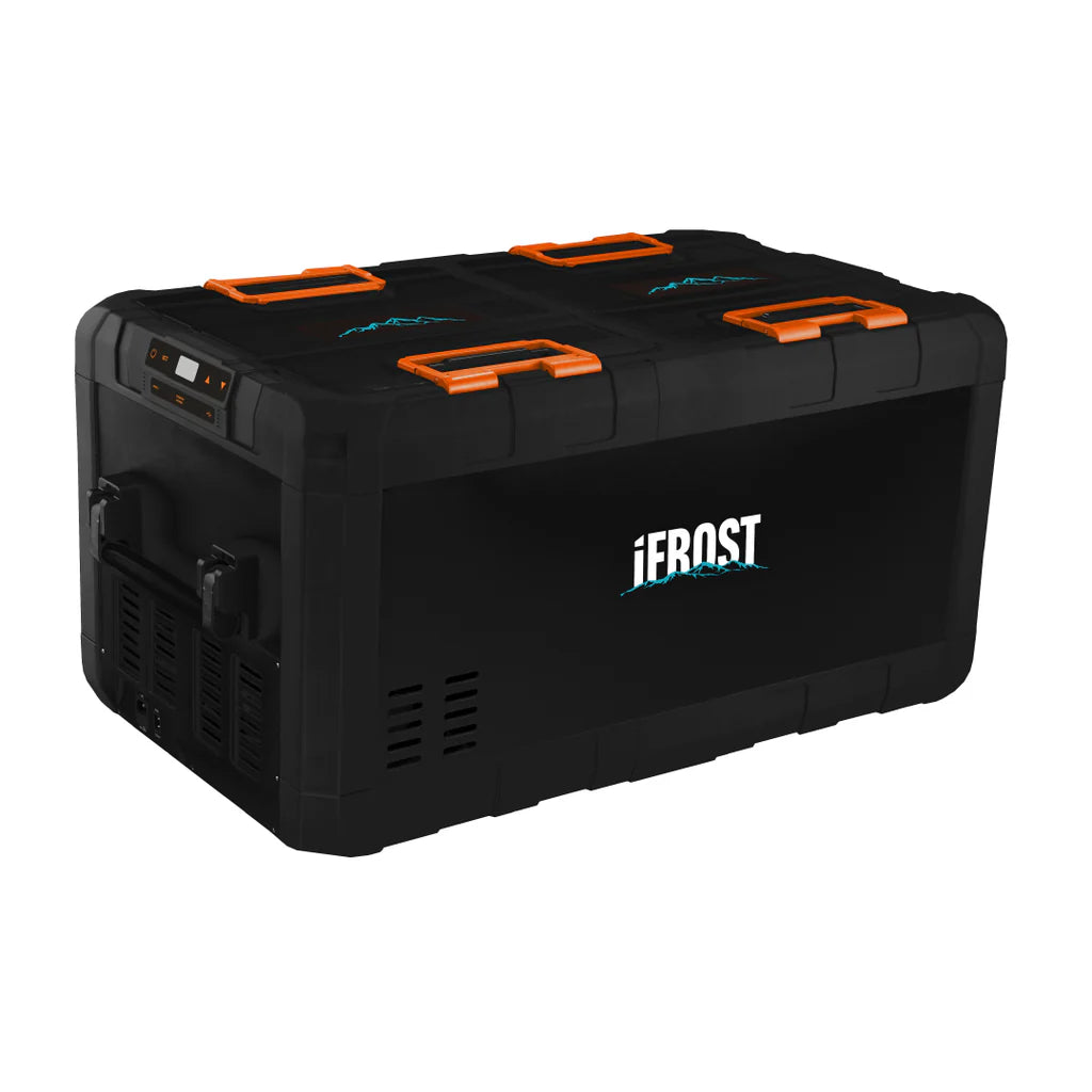 A photo of a black and orange iTechWorld iFrost 95L portable camping fridge/freezer sitting on a slight angle.
