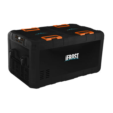 A photo of a black and orange iTechWorld iFrost 95L portable camping fridge/freezer sitting on a slight angle.