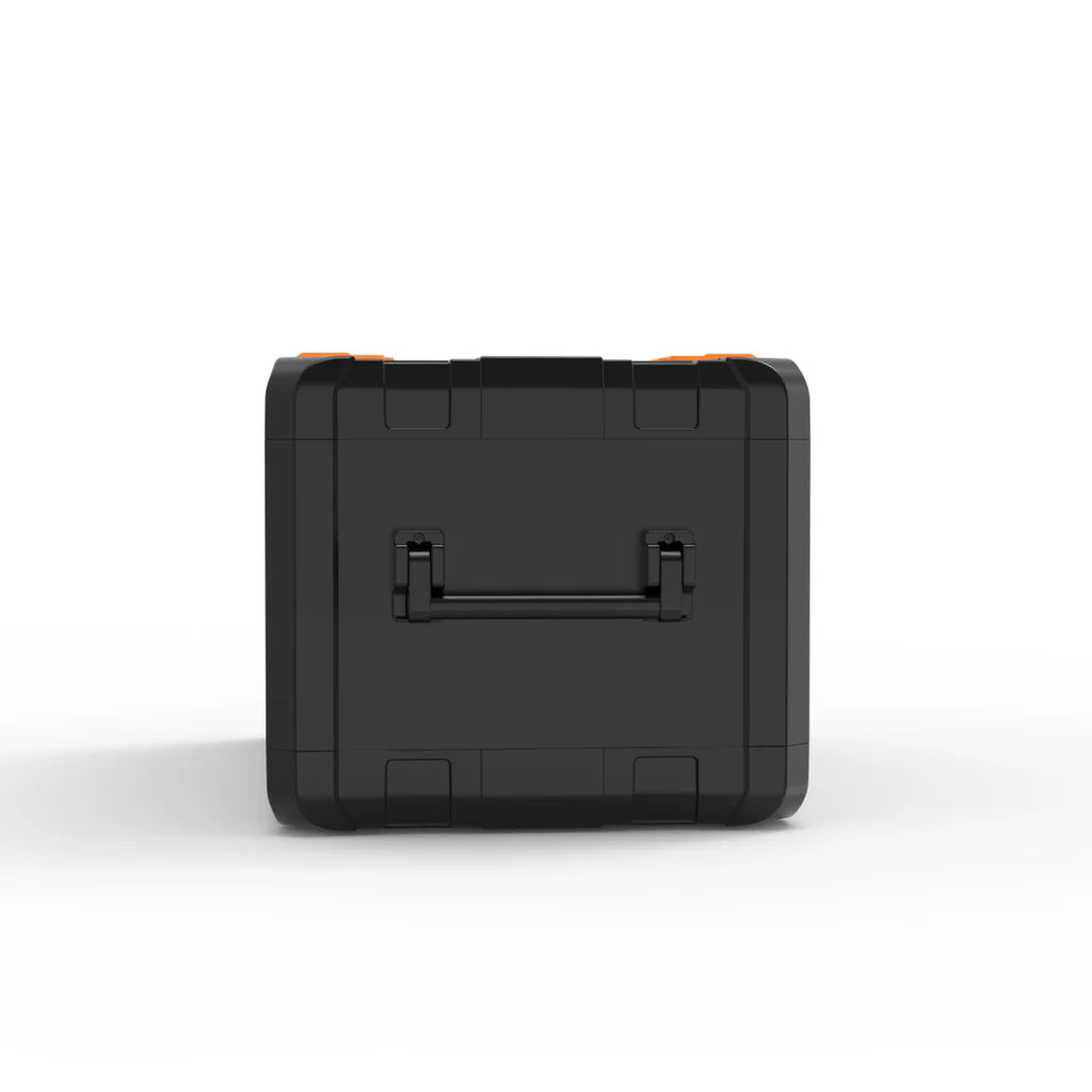 A photo of a black and orange iTechWorld iFrost 95L portable camping fridge/freezer sitting side on showing its handle.
