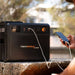 iTech 160x Pro Dual Battery System with phone connected on outdoor setting