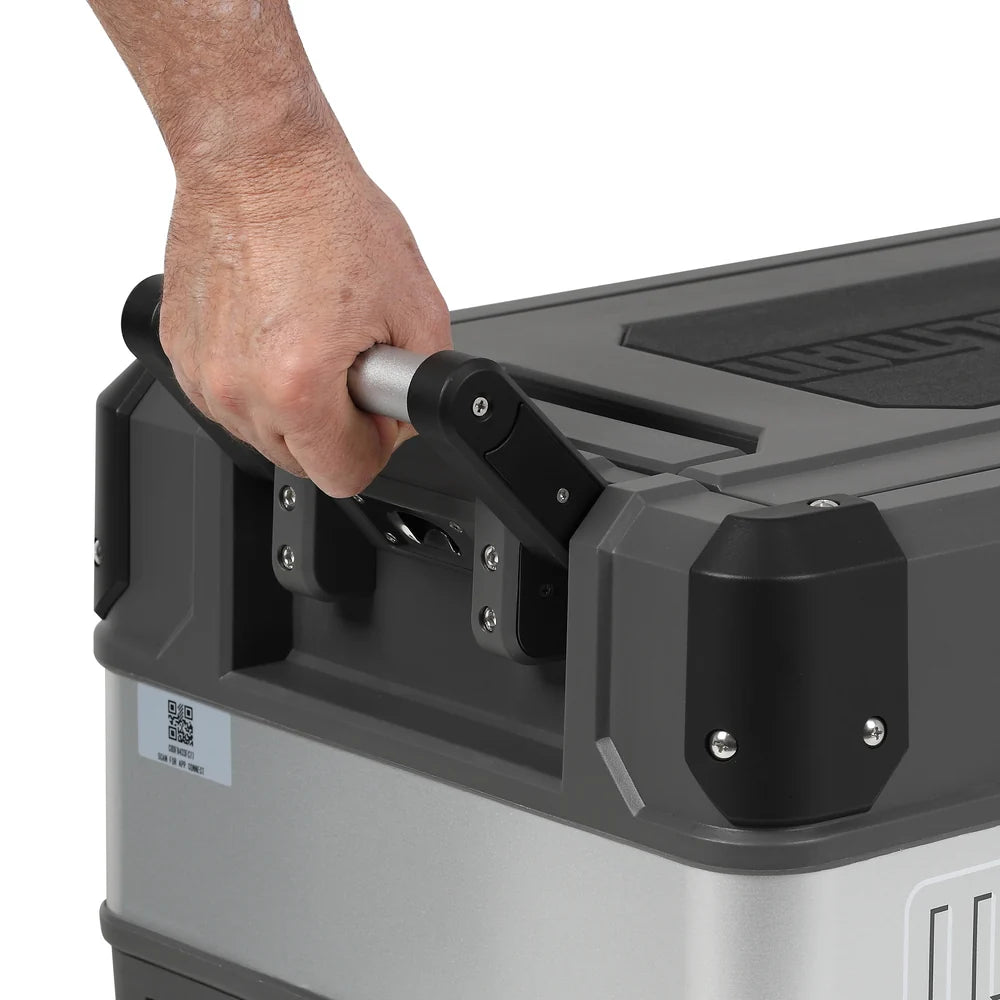 in the photo a myCOOLMAN Dual Zone 69L Fridge & Freezer Hand on handle on white background