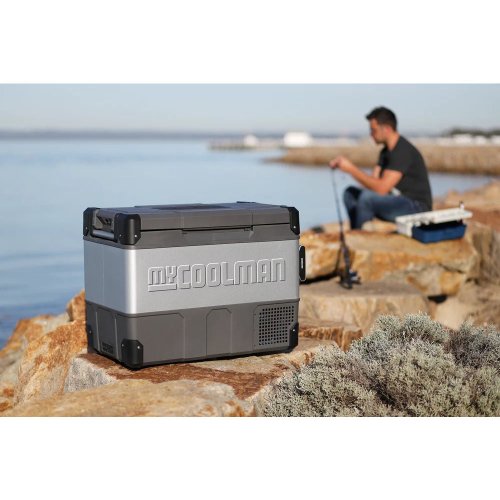 in the photo a myCOOLMAN Dual Zone 69L Fridge & Freezer In outdoor setting near sea