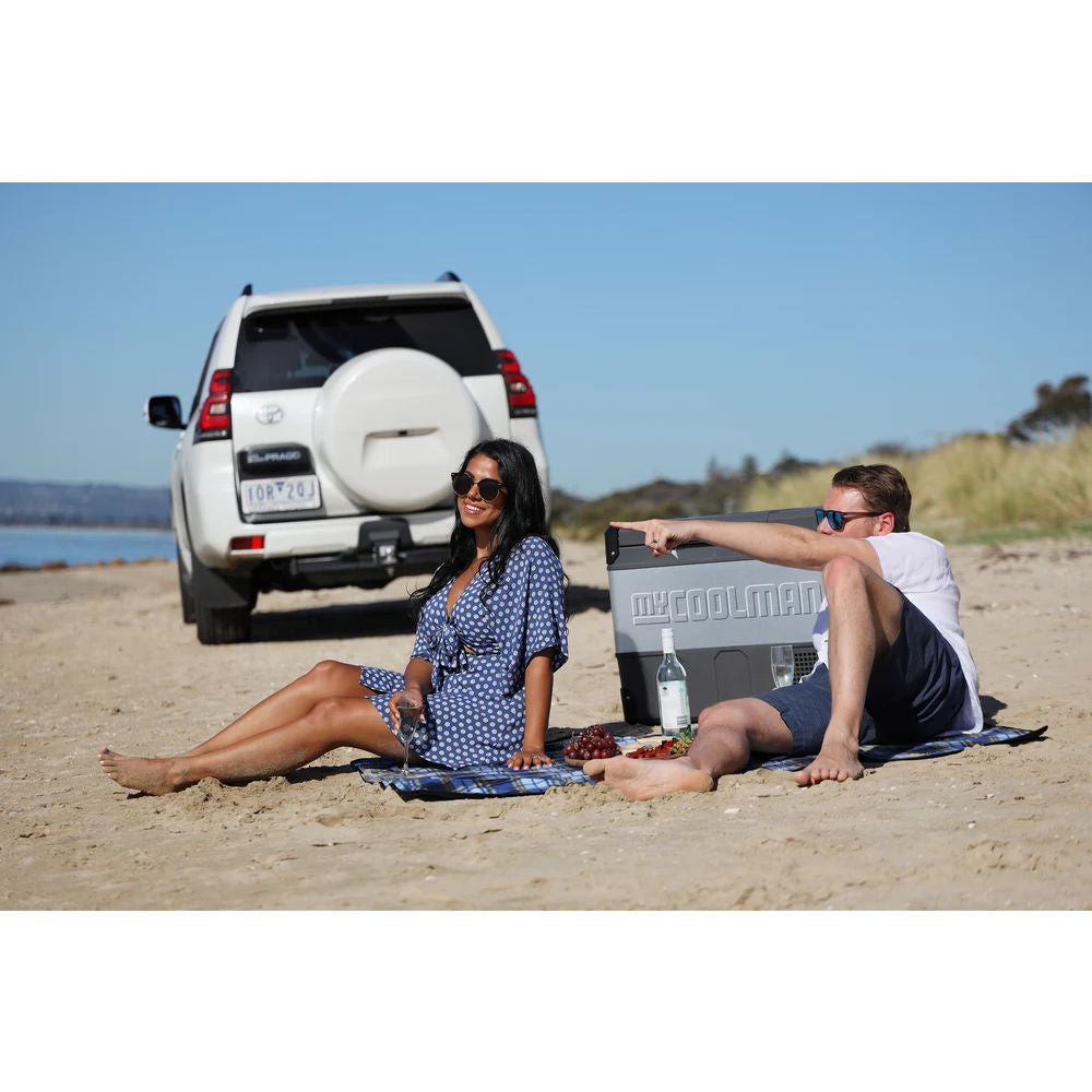 in the image a myCOOLMAN Dual Zone 69L Fridge & Freezer couple near sea