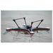 SwellPro Fisherman FD1S fishing drone floating upside down on calm water, showing the buoyant self-righting airframe.