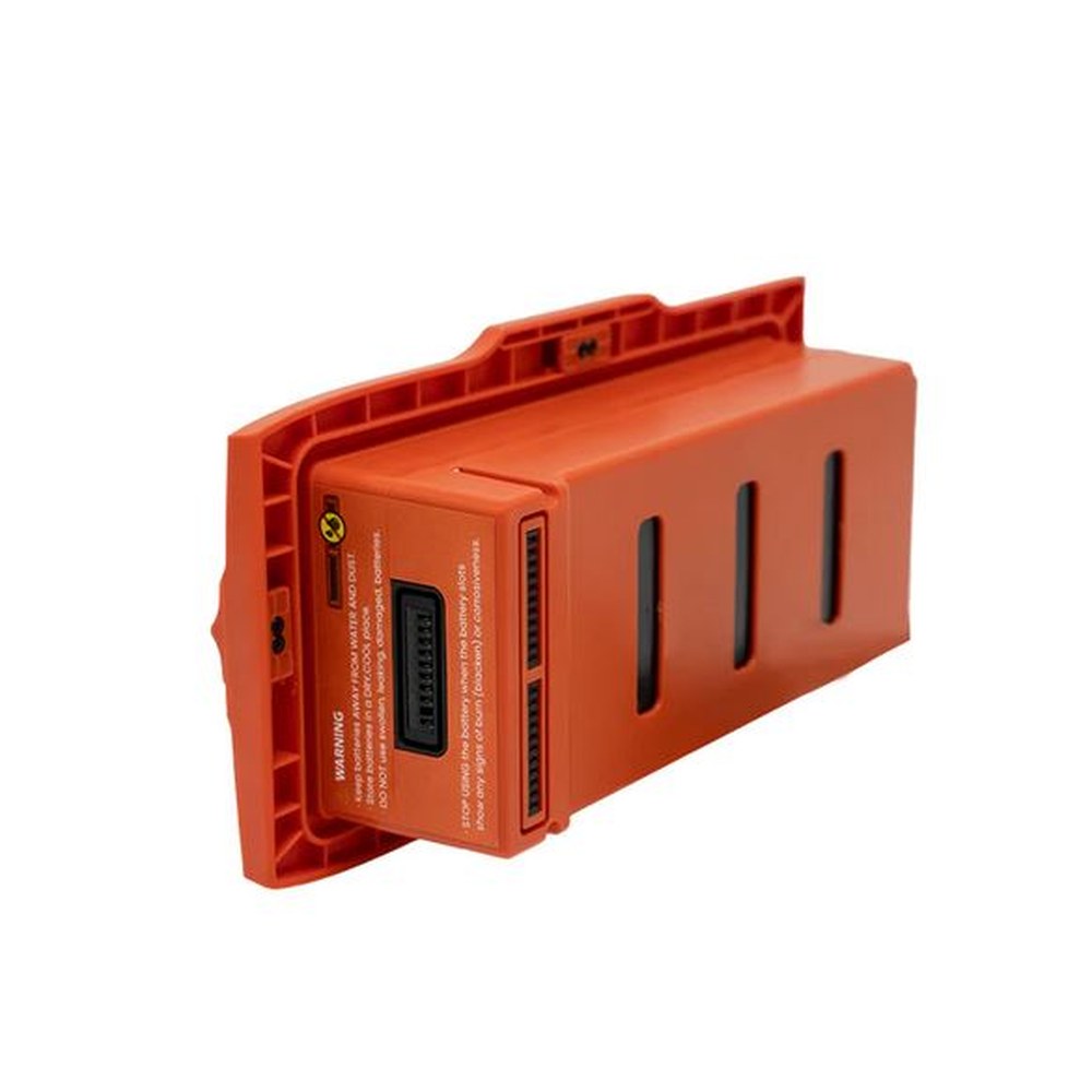 Angled view of the orange Swellpro Fisherman Max 4500mAh flight battery showing the ribbed casing and side ventilation slots on a white background.