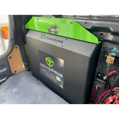 Custom Lithium dual battery installed behind the seat of a Toyota LandCruiser 79 Series dual cab with wiring connected.